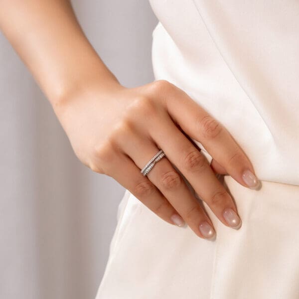 Model Wears Marie 1.7 White Gold Diamond Pinched Centre Pave Wedding Band Angela 1.1 U Prong Half Set Wedding Ring