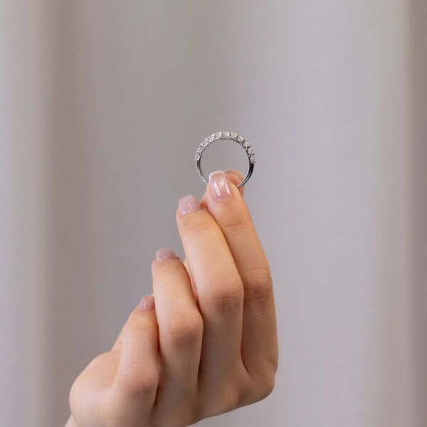 Model Wears Maxine A Side View White Gold Diamond Open Scalloped Half Prong Set Wedding Ring