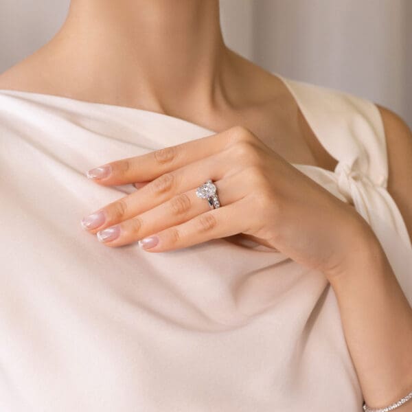 Model Wears Millie 2.0 White Gold Diamond Pave Set Wedding Band Holly Oval 3.09Ct Solitaire Ring