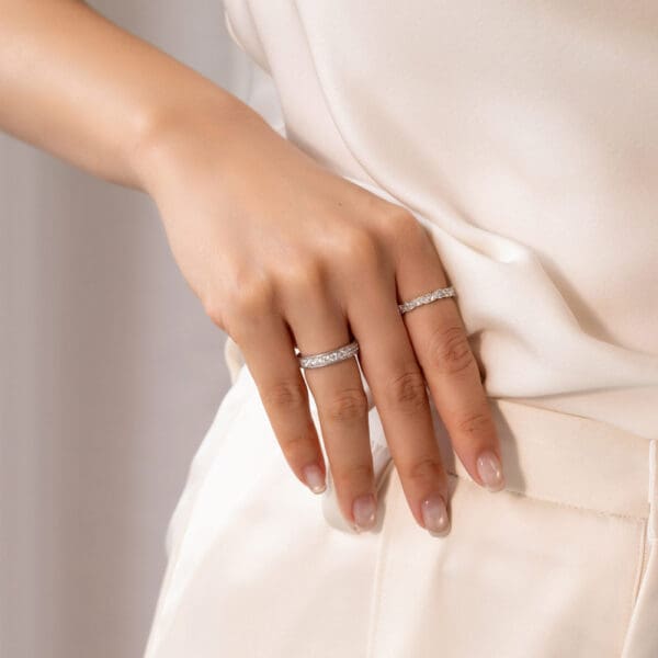 Model Wears Millie 2.5 White Gold Moissanite Pave Set Wedding Band Elle Marquise Round Prong Set Cluster Wedding Ring