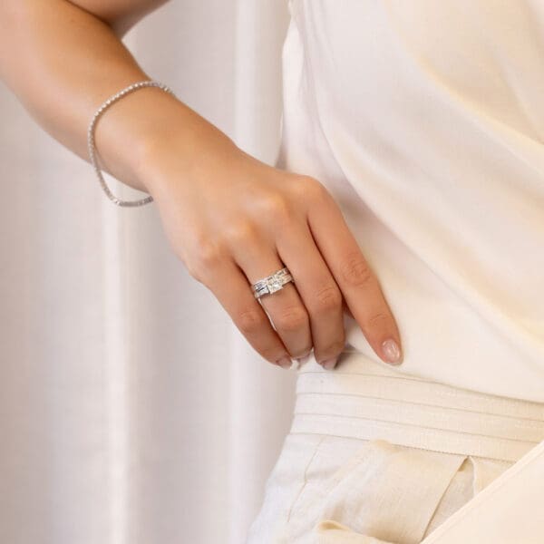 Model Wears Sia C White Gold Diamond Princess Baguette Channel Set Wedding Ring Sia 6.5 Square Baguette Low Setting Ring