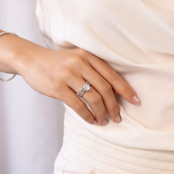 Model Wears Tamika White Gold Diamond Bezel Set Round Pave Marquise Shaped Wedding Band Daphne Oval 9X7 Floral Halo Ring