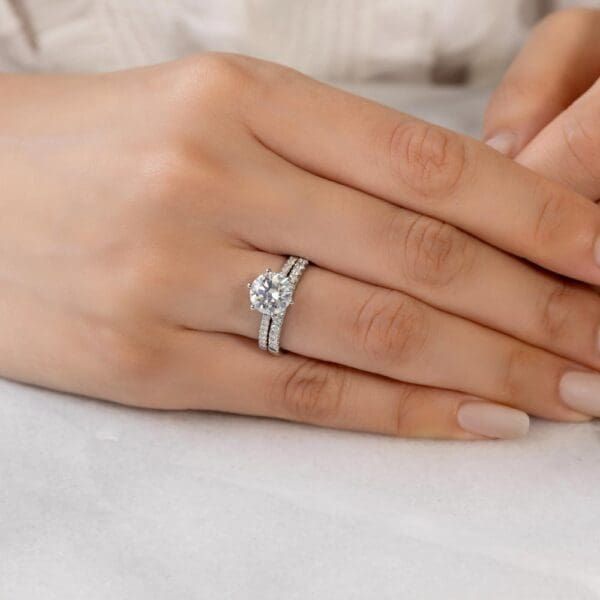 Model Wears White Gold Aspley A Diamond Aspley 8.0 Moissanite Straight Prong Set Wedding Ring