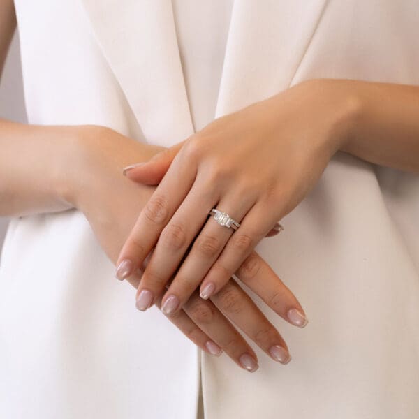 Model Wears White Gold Diamond Aspley A Wedding Band Alexa 7X5 Prong Set Trilogy Ring