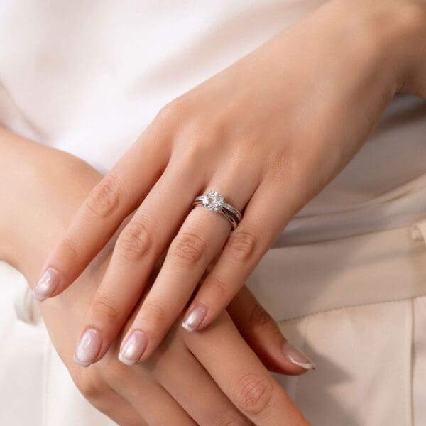 Model Wears White Gold Diamond Carmen 1.1 Channel Set Wedding Band Hattie Round 2.00Ct Under Rail Bridge Stone Set Ring
