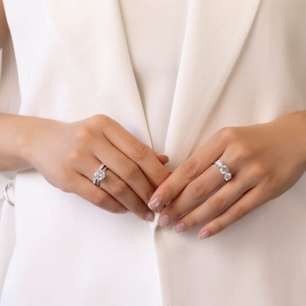 Model Wears White Gold Diamond Elle Marquise Round Band Ayesha 1.50Ct Trilogy Ring Monica Cushion 9.0 Solitaire Ring