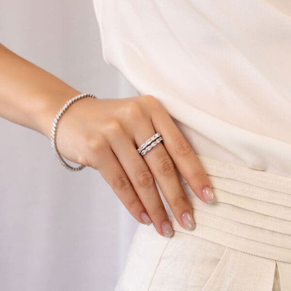 Model Wears White Gold Diamond Lena Oval Half Eternity Wedding Band Kyla Emerald East West Prong Set Ring