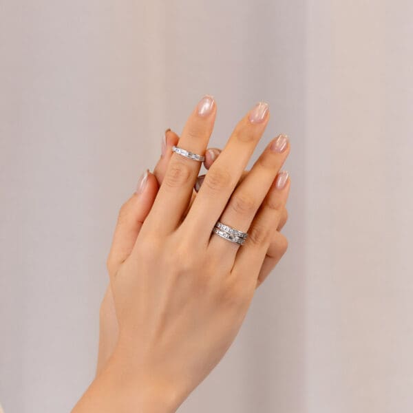 Model Wears White Gold Diamond Sia A B C Princess Baguette Cut Channel Set Wedding Ring
