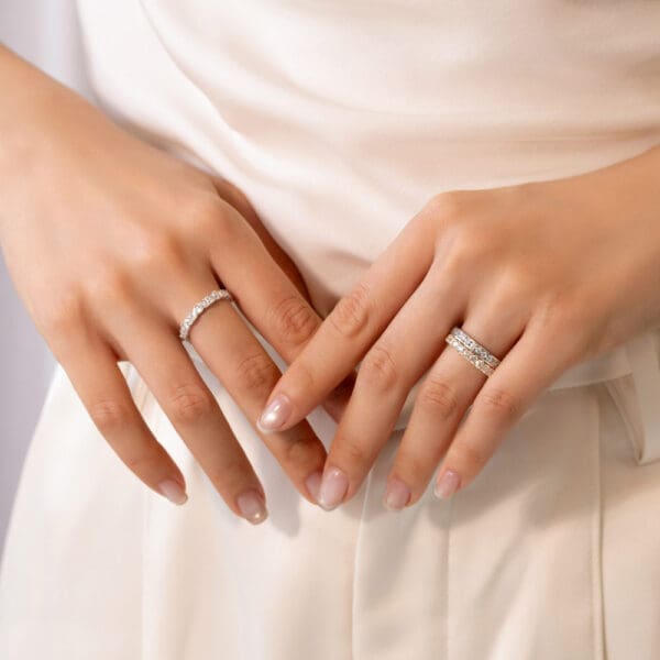 Model Wears White Yellow Gold Diamond Carmen 2.0 Channel Set Wedding Band Angela 2.5 U Prong Set Elle Marquise Round Ring