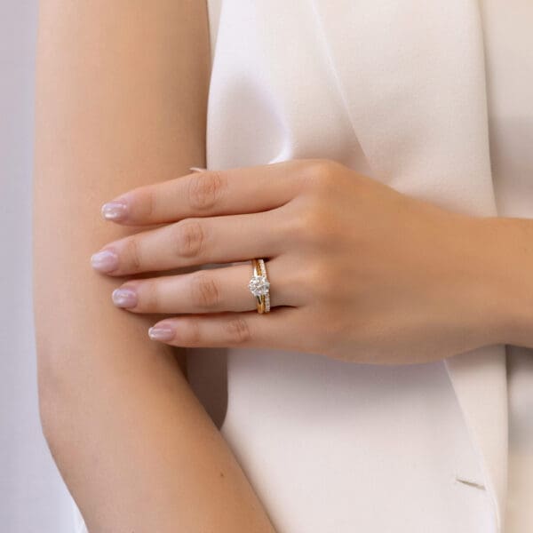 Model Wears Yellow Gold Diamond Angela 1.7 U Prong Half Set Wedding Band Audrey 7.5 Knife Edge Solitaire Ring