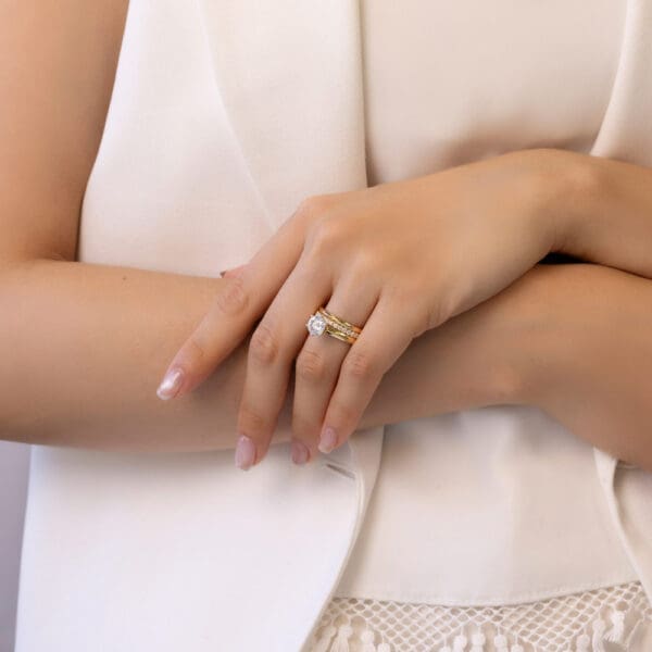 Model Wears Yellow Gold Diamond Audrey 7.5 Audrey A Knife Edged Plain Band Angela 1.7 U Prong Half Set Wedding Ring