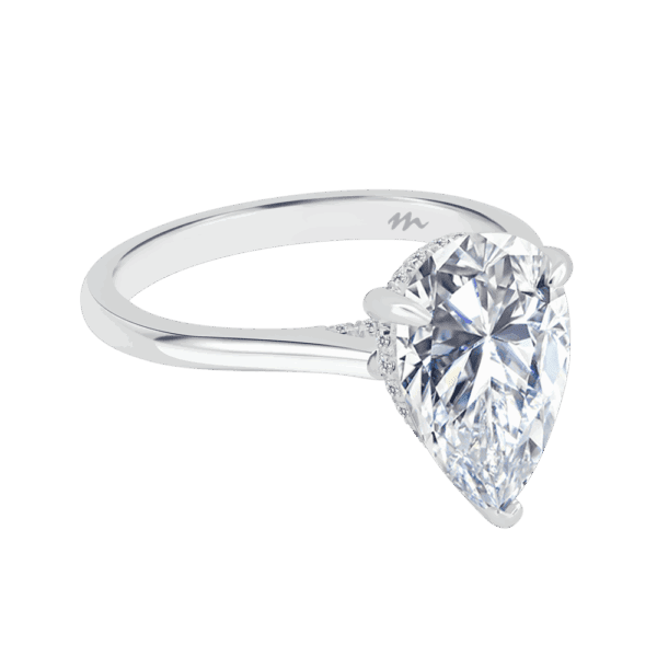 Hattie Pear 12X8 Angled White Gold Moissanite 4 Prong Accented Under Rail Bridge Tapered Engagement Ring