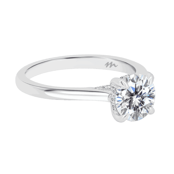 Hattie Round 7 0 Angled White Gold Moissanite 4 Prong Accented Under Rail Bridge Tapered Engagement Ring