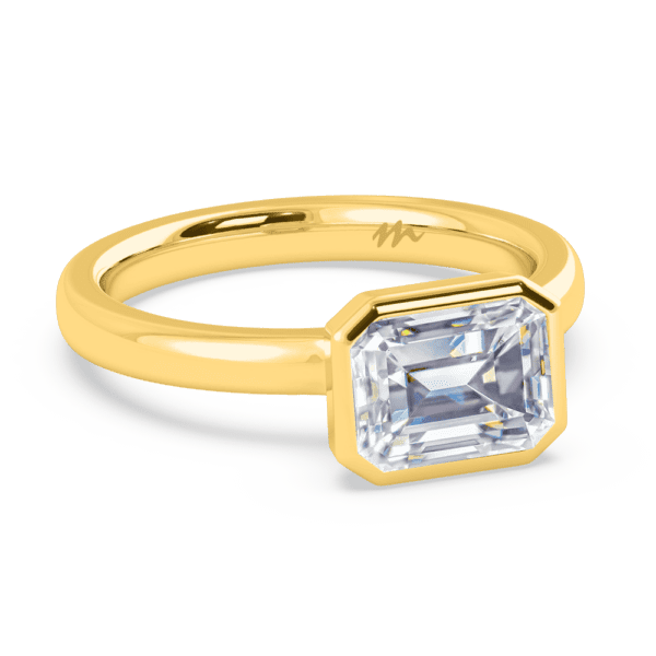 Iliana 8X6 Angled Yellow Gold Moissanite East West Emerald Semi Rounded Solitaire Ring