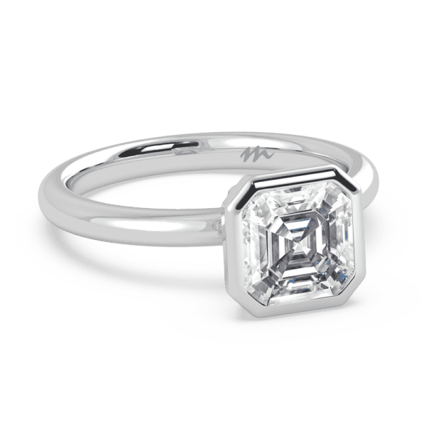 Lottie Asscher Angled White Gold Moissanite Bezel Rounded Solitaire Ring
