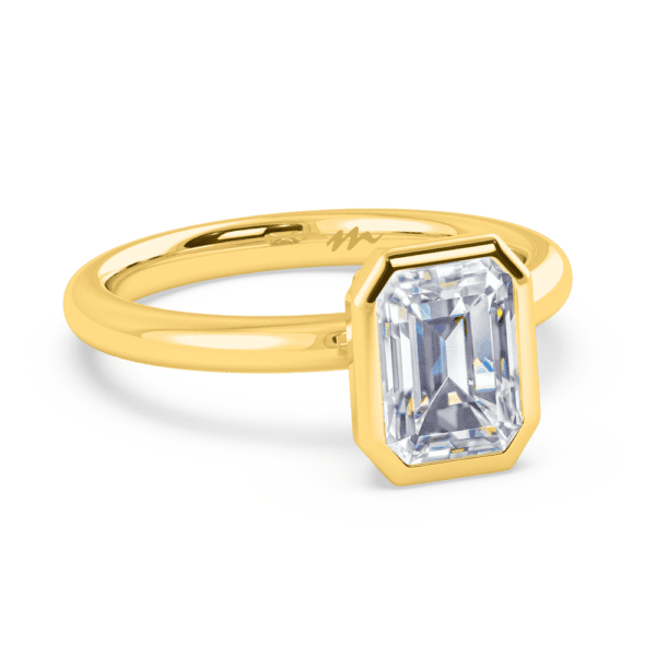 Lottie Emerald 8X6 Angled Yellow Gold Diamond Bezel Rounded Solitaire Ring