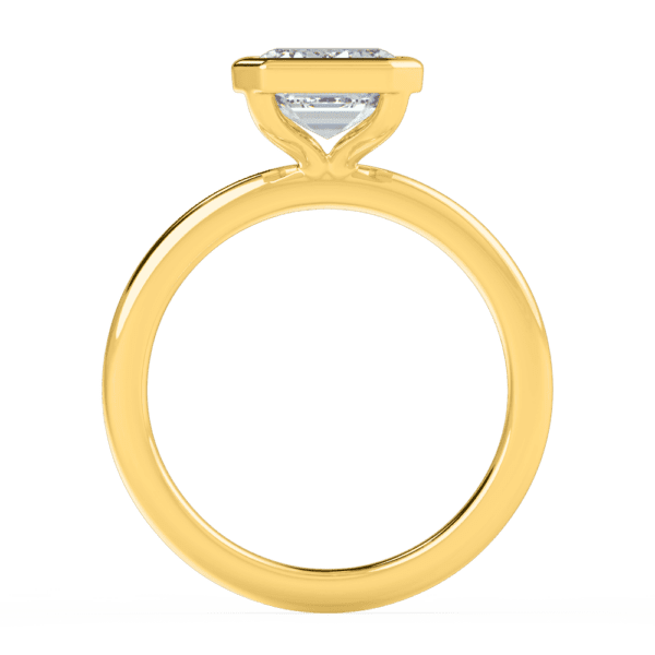 Lottie Emerald 9X7 Side Yellow Gold Diamond Bezel Rounded Solitaire Ring