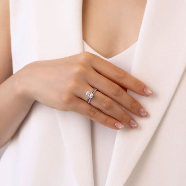 Model Wears Angela 1 5 Alternating Pink White Gold Diamond U Prong Wedding Band Lanefield Oval 9X7 Open Gallery Solitaire Ring