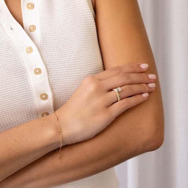 Model Wears Holly Emerald 1 85Ct White Gold Diamond Solitaire Ring Angela 1 7 Moissanite U Prong Half Set Wedding Band