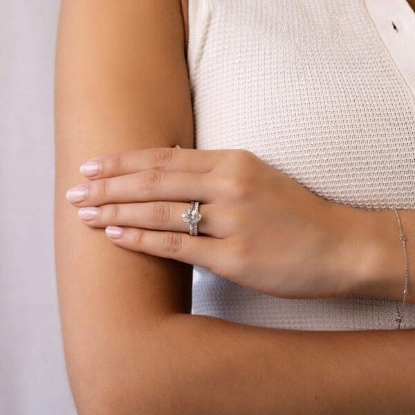 Model Wears Holly Oval 2 01Ct White Gold Diamond Half Rounded Band Solitaire Ring Angelica 2 0 U Prong Wedding Ring