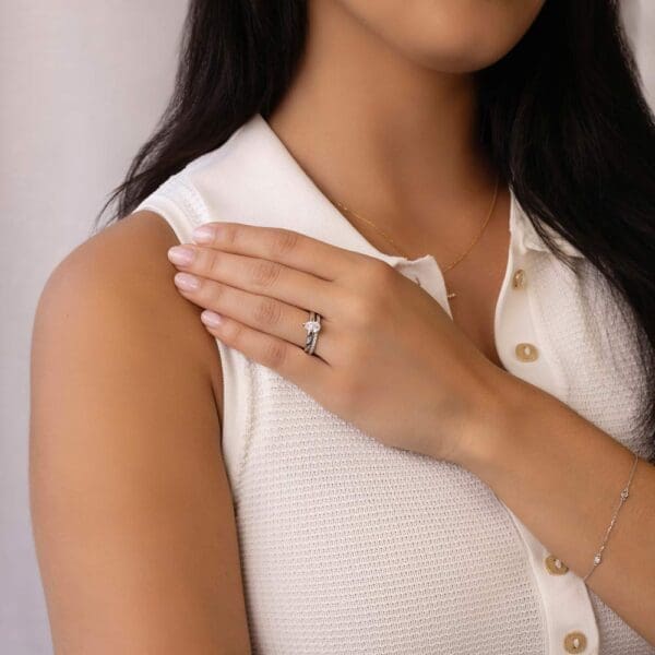 Model Wears Holly Pear 8X5 White Gold Diamond 3 Prong Rounded Band Solitaire Ring Angela 1 5 U Prong Half Set Wedding Band