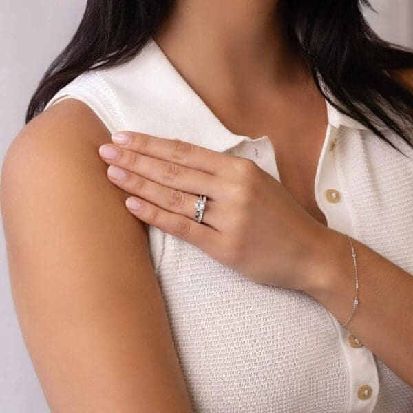 Model Wears Holly Round 7 0 White Gold Diamond 4 Prong Solitaire Ring Angelica 2 0 U Prong Set Wedding Band