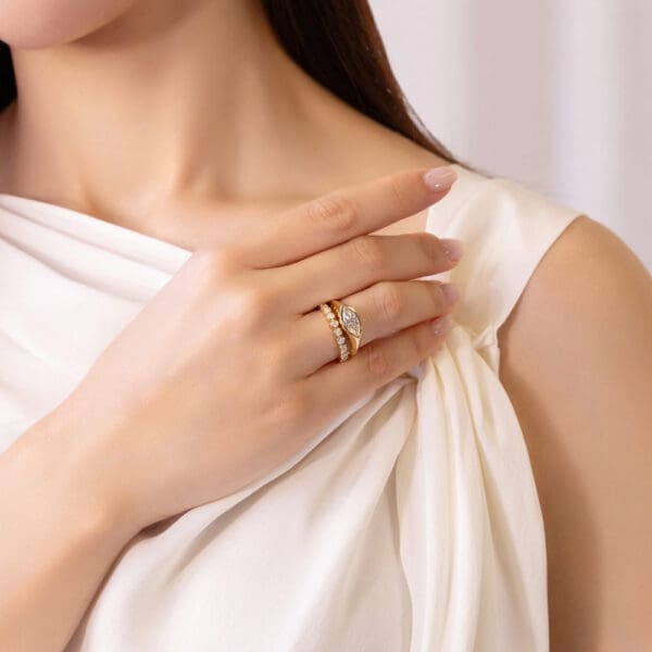 Model Wears Jolene Marquise Yellow Gold Diamond East West Knife Edge Solitaire Ring Roxie 2 0 Moissanite Round Bezel Set Band