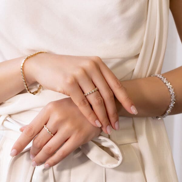 Model Wears Roxie 2 5 Yellow Gold Moissanite Jodie Asymmetrical Round Bezel Set Ring Perrine Diamond Emerald Tennis Bracelet