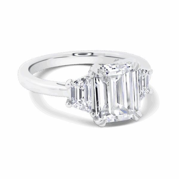 Aubrey Emerald 10X8 Angled White Gold Moissanite Trapezoid Double Prong Set Trilogy Ring