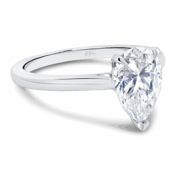 Lydia Pear 10X7 Angled White Gold Moissanite Pear Cut On 3 Prong Rounded Band Solitaire Ring