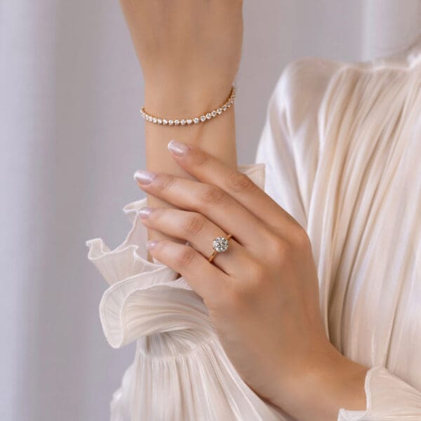 Model Wears Coral 2 00Ct Yellow Gold Diamond Protea Basket Accented Bridge 6 Prong Solitaire Ring