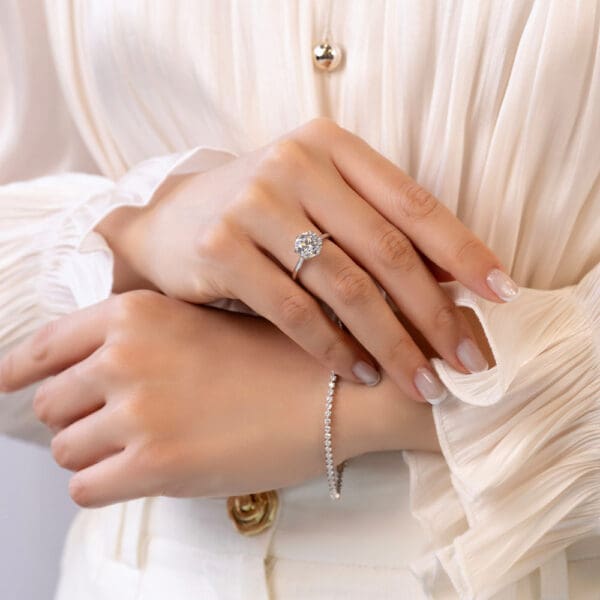 Model Wears Coral 3 07Ct White Gold Diamond 6 Prong Protea Basket Accented Bridge Solitaire Ring