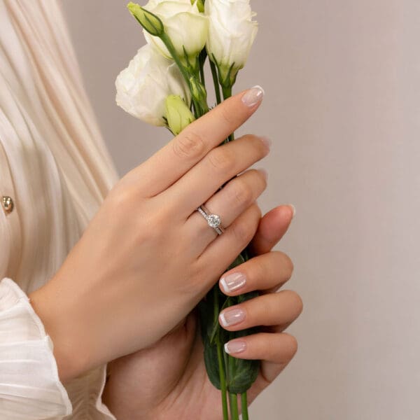 Model Wears Correa 1 01Ct White Gold Diamond Tapered Band Floral Basket Solitaire Ring Angela 1 5 U Prong Half Set Ring