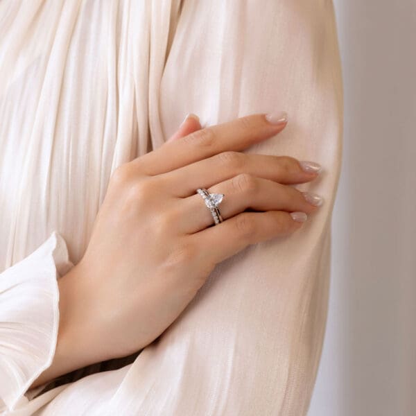 Model Wears Hattie Pear 10X7 White Gold Diamond Accented Under Rail Bridge Ring Gracie 2 0 Moissanite Scalloped Round Ring