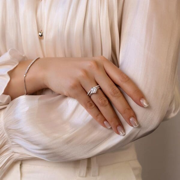 Model Wears Protea 8 0 White Gold Diamond Floral Gallery Split Shank Solitaire Edith 1 5 Moissanite V Dip Centre Ring