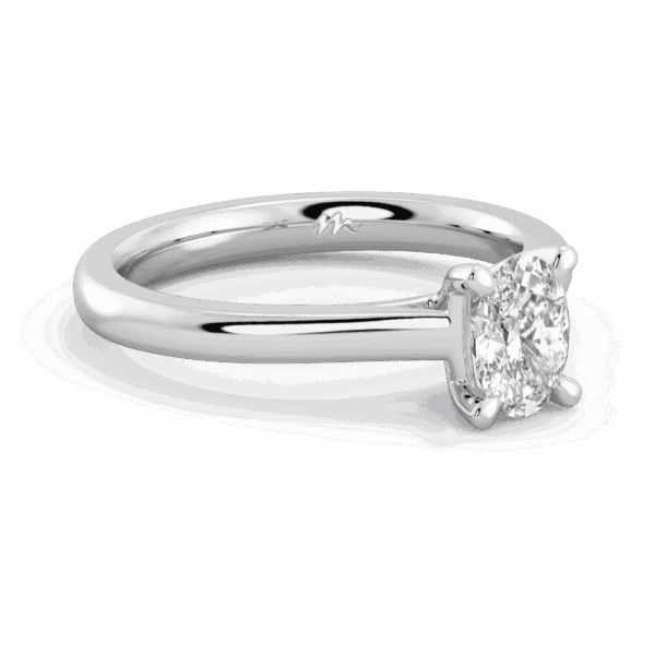Lydia Oval 7X5 Angled White Gold Moissanite 4 Prong V Setting Tapered Band Solitaire Ring