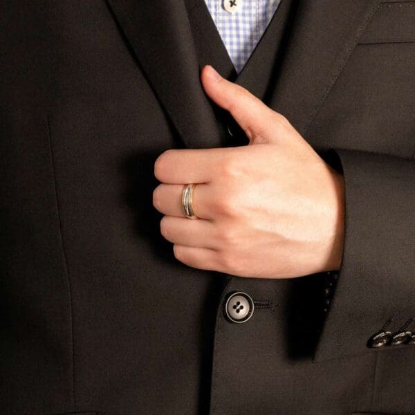 Model Wears F17 6Mm Two Tone Semi Rounded Mens Wedding Band With Smooth Raised Edges