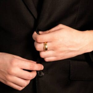 Model wears F51 8mm yellow gold rounded band inlay centre decorative milgrain trim mens wedding band
