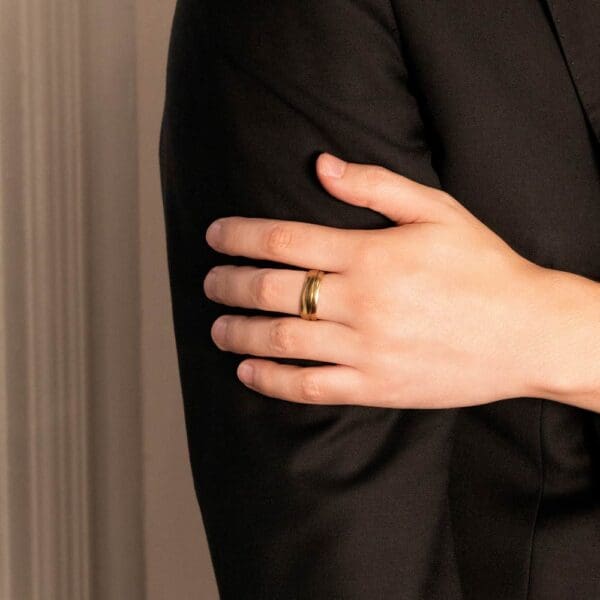Model Wears G64M 7Mm Yellow Gold Semi Rounded Band Polished Offset Groove Mens Wedding Band