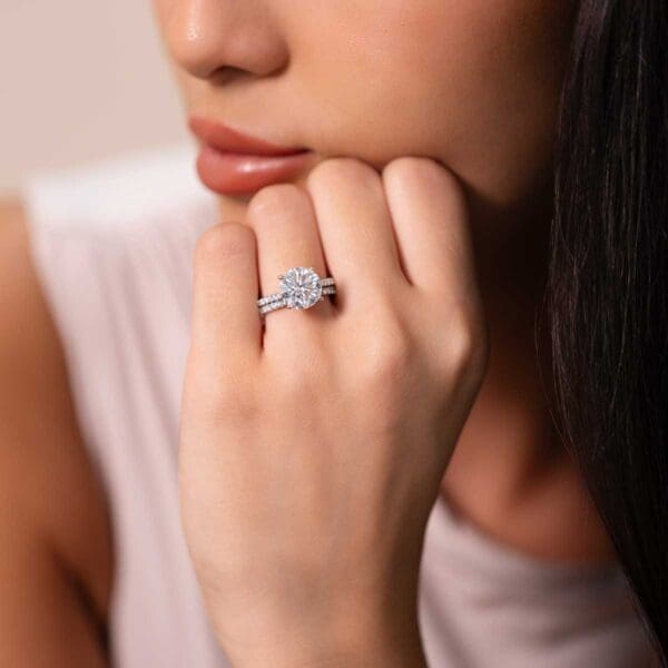 Model Wears Harmony Round 10 0 Diamond Under Rail Bridge Accents Ring With Angelica 1 5 White Gold Band