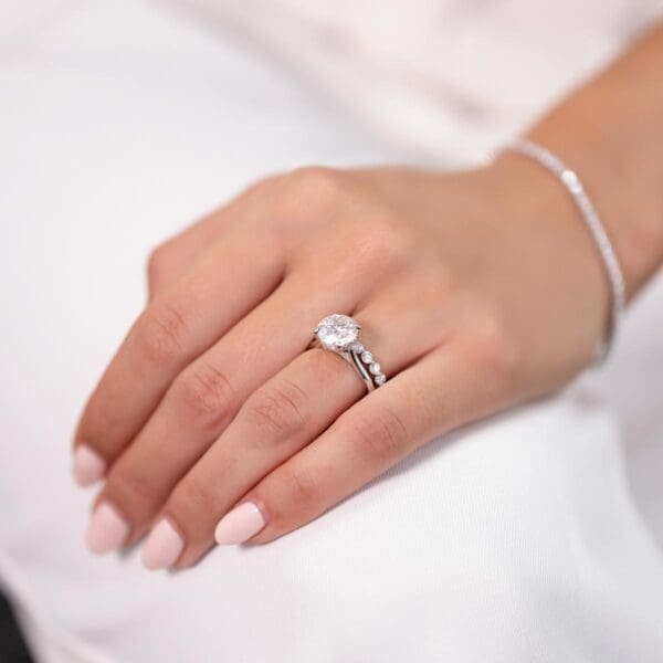 Model Wears Hattie Round 10 0 Diamond Under Rail Bridge Accents Tapered Ring With Gracie 2 5 Scalloped White Gold Band