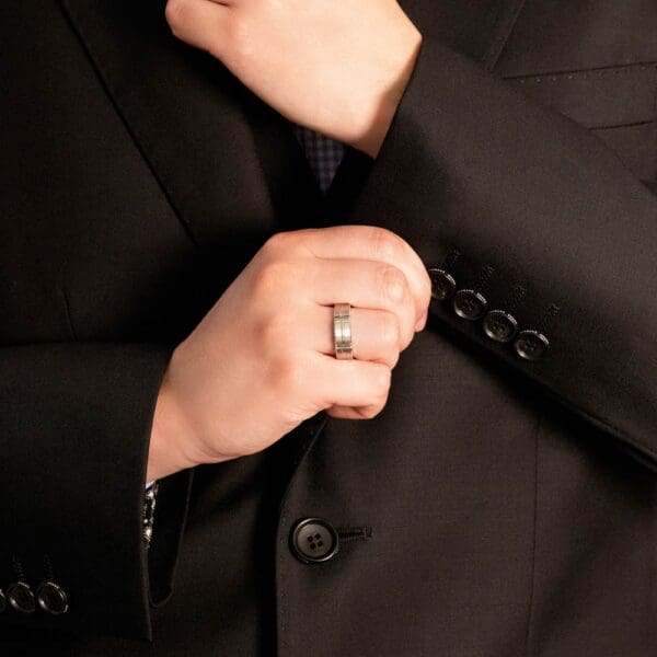 Model Wears Pj332 6 5Mm White Gold Flat Emery Polished Centreline Groove Wedding Rings For Men