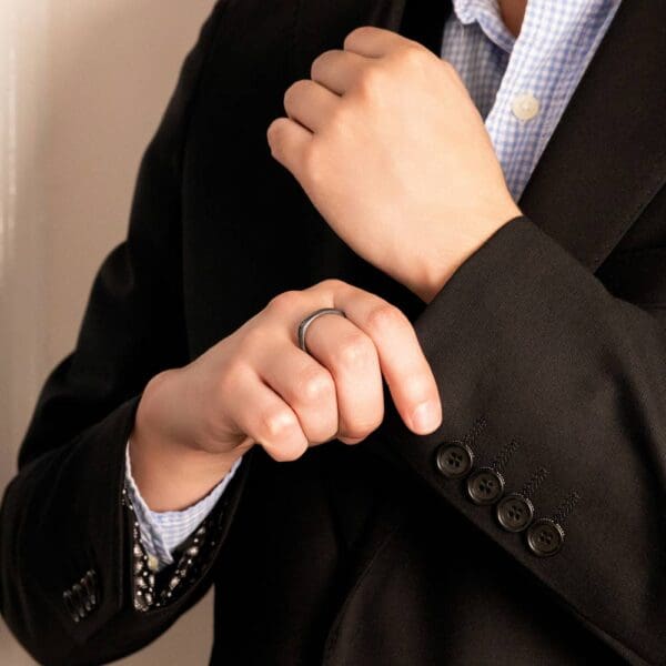 Model Wears Sq4 4Mm Hypoallergenic Zirconium Square Shaped Plain Mens Wedding Band With Smooth Corners