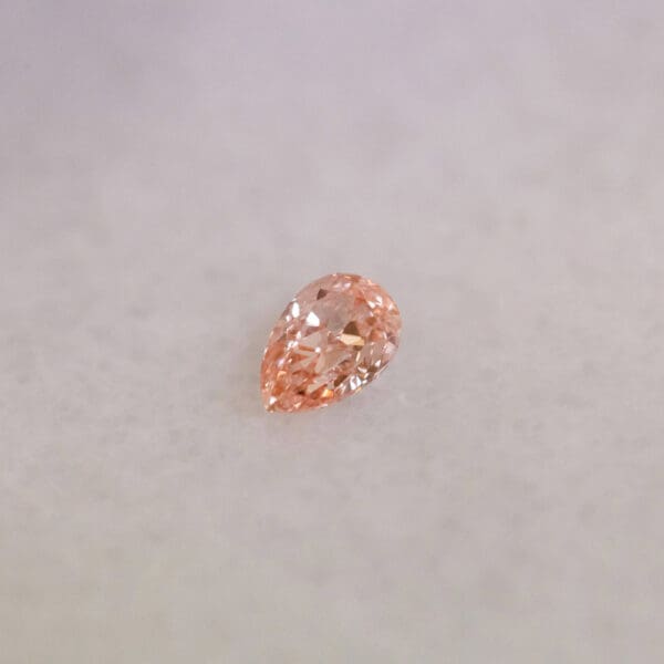 Pear Cut 0 66Ct Fancy Intense Pink Vvs2 569316349 Angle