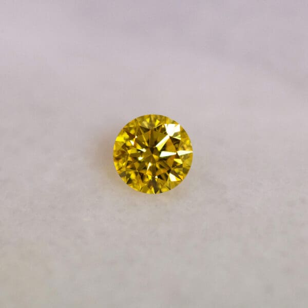 Round Cut 1 04ct Fancy Vivid Yellow VVS2 582359565 Front 1