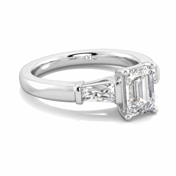 Debbie Emerald 7X5 Angled White Gold Moissanite Prong Set Tapered Side Stones Trilogy Ring