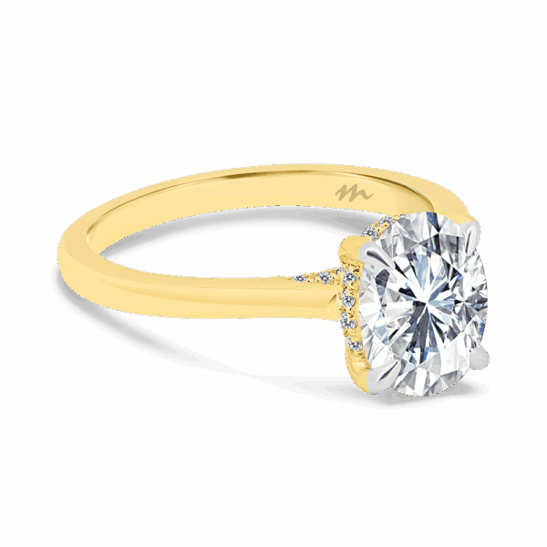 Hattie Oval 9X7 Angled Yellow Gold Moissanite 4 Prong Accented Under Rail Bridge Tapered Engagement Ring