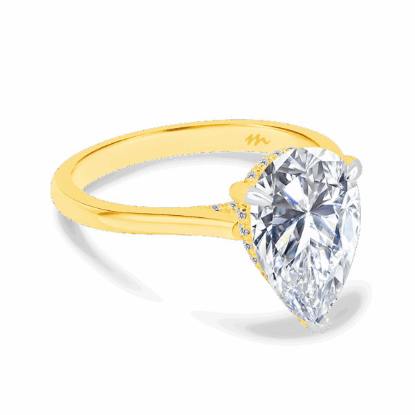 Hattie Pear 12X8 Angled Yellow Gold Moissanite 4 Prong Accented Under Rail Bridge Tapered Engagement Ring