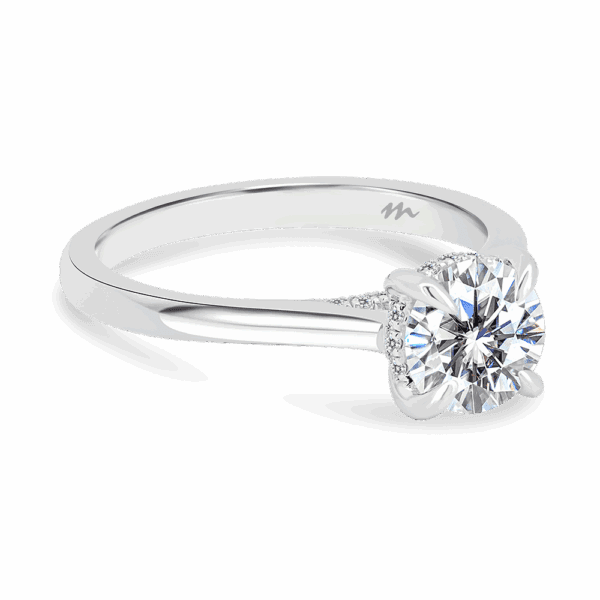 Hattie Round 6 5 Angled White Gold Moissanite 4 Prong Accented Under Rail Bridge Tapered Engagement Ring