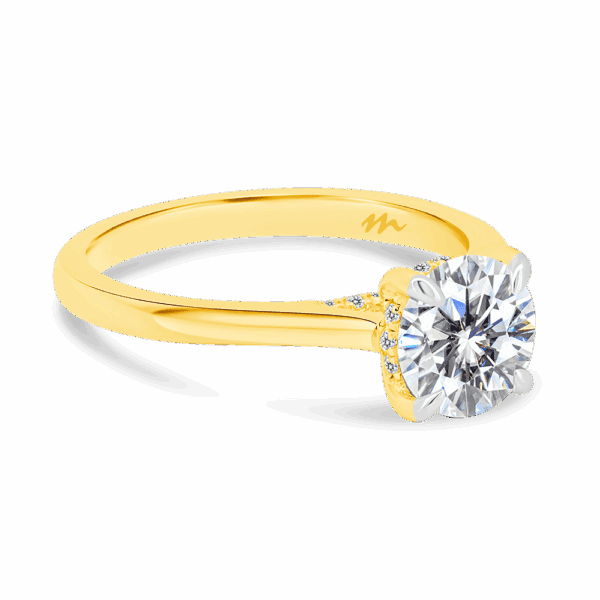 Hattie Round 7 0 Angled Yellow Gold Moissanite 4 Prong Accented Under Rail Bridge Tapered Engagement Ring